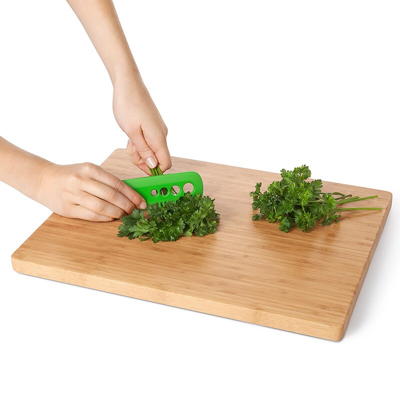 Multifunctional Kitchen Tool: Vegetable Peeler and Leaf Comb