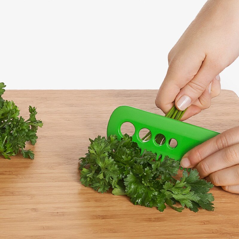 Multifunctional Kitchen Tool: Vegetable Peeler and Leaf Comb